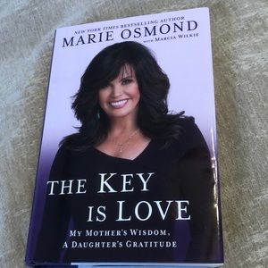 Clearance price Marie Osmond Book “The Key Is Love”.       NEW